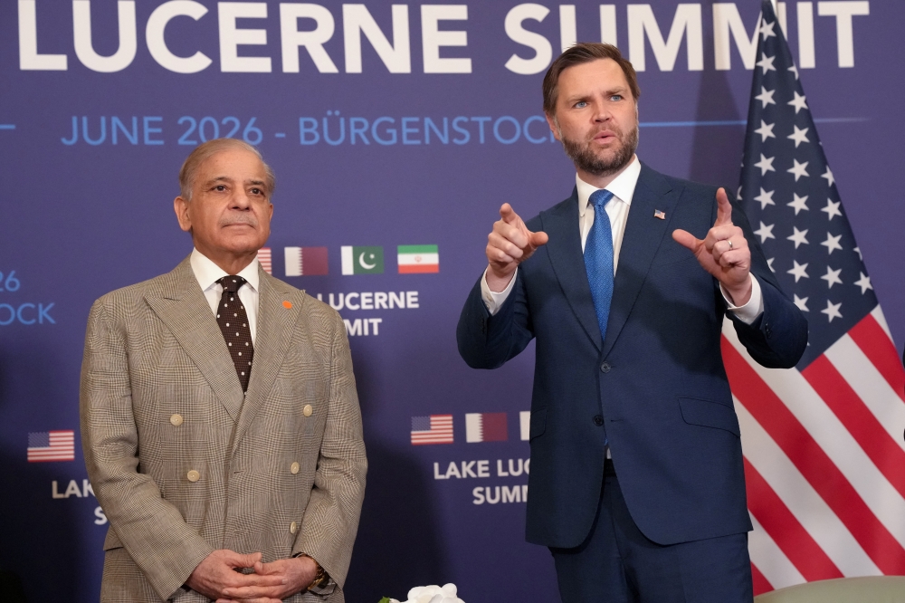 U.S. Vice President JD Vance meets with Pakistan's Prime Minister Shehbaz Sharif for high-level talks aimed at advancing a deal to end the Middle East conflict, at the Buergenstock Resort Lake Lucerne, near Stansstad, Switzerland, June 21, 2026. 
