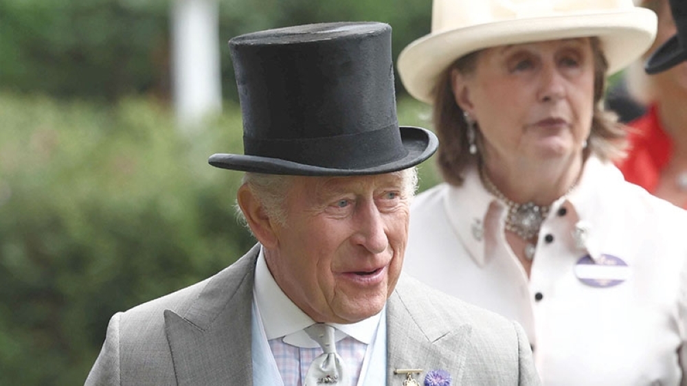 Britain's King Charles III reacts on the fifth day of the Royal Ascot horse racing meeting in Ascot, west of London. — AFP