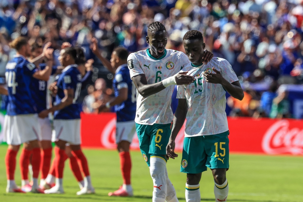 Senegal's #06 Ciss and  #15 Krepin. — AFP