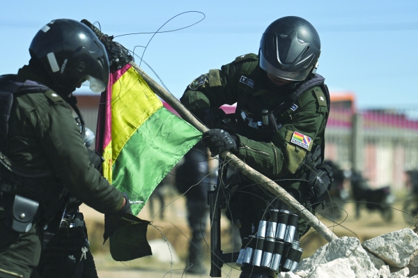 Bolivia crisis to ease after lawmakers back emergency