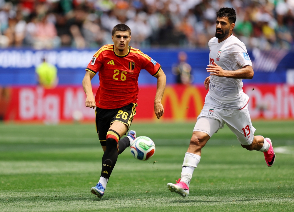 
Belgium's Matias in action with Iran's Kanani. — Reuters