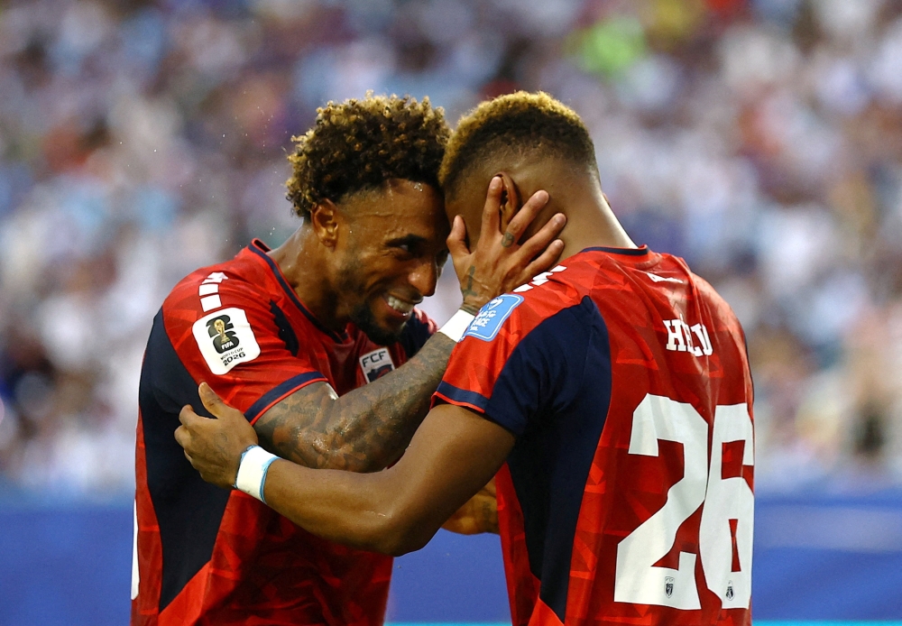 Cabo Verde's Helio celebrates scoring their second goal with Ryan Mendes. — Reuters