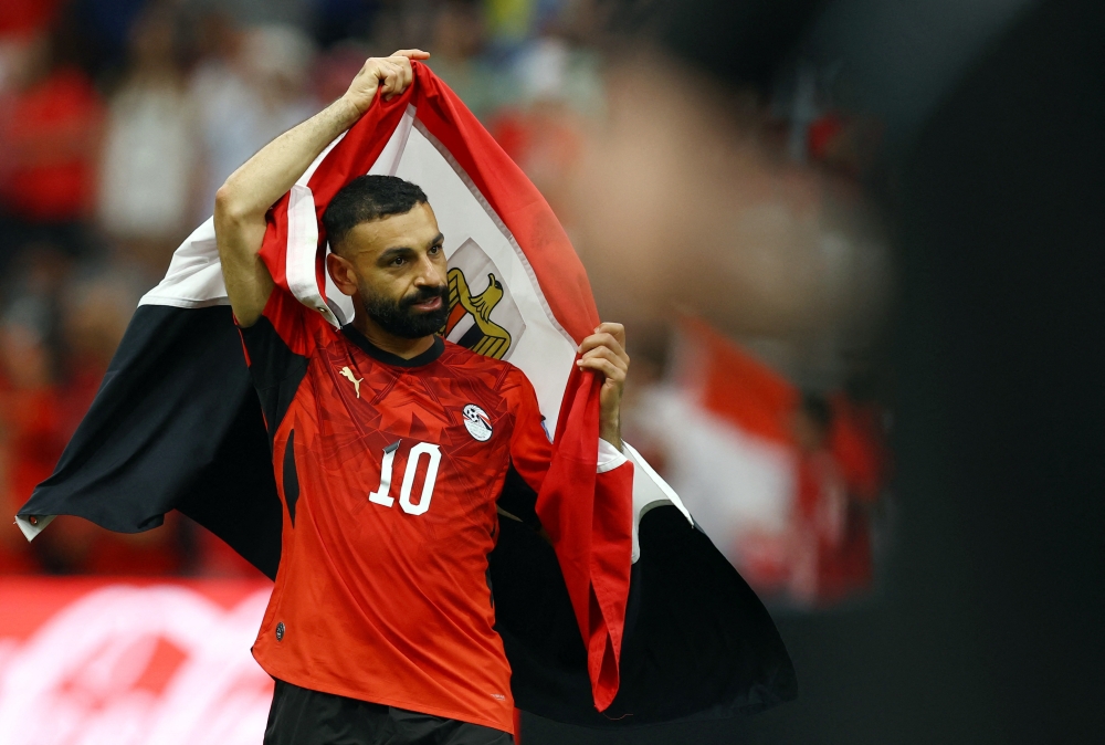  
Egypt's Mohamed Salah celebrates after the match. — Reuters  