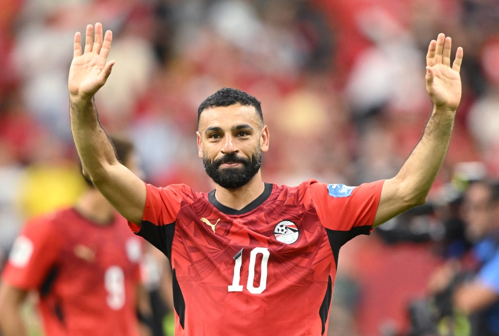  
Egypt's Mohamed Salah celebrates after the match. — Reuters 