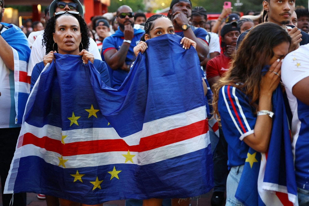  
Cape Verde fans react as watch the match at the fan festival in Boston    