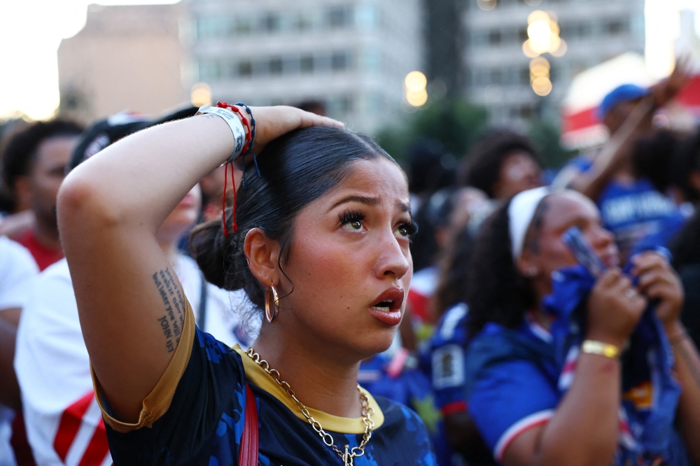 
Cape Verde fans react as watch the match at the fan festival in Boston 