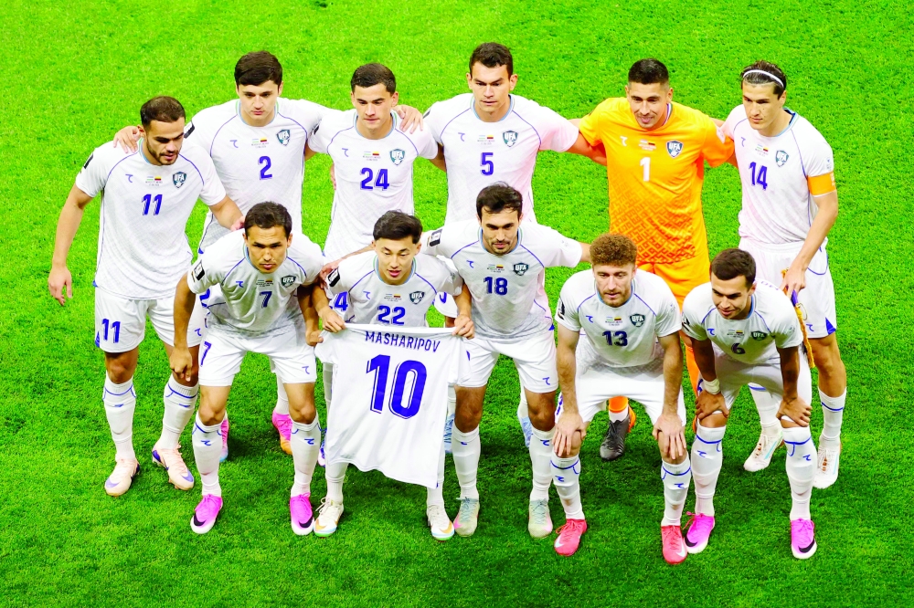 Uzbekistan's players pose for a team photo ahead of the 2026 World Cup Group K football match between Uzbekistan and Colombia at the Mexico City Stadium. — AFP