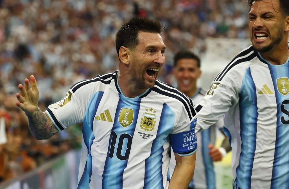  
Argentina's Lionel Messi celebrates scoring their second goal 