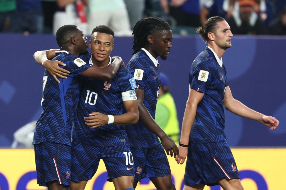 France's #07 Dembele (L) celebrates scoring third goal with #10 Kylian Mbappe. — AFP 