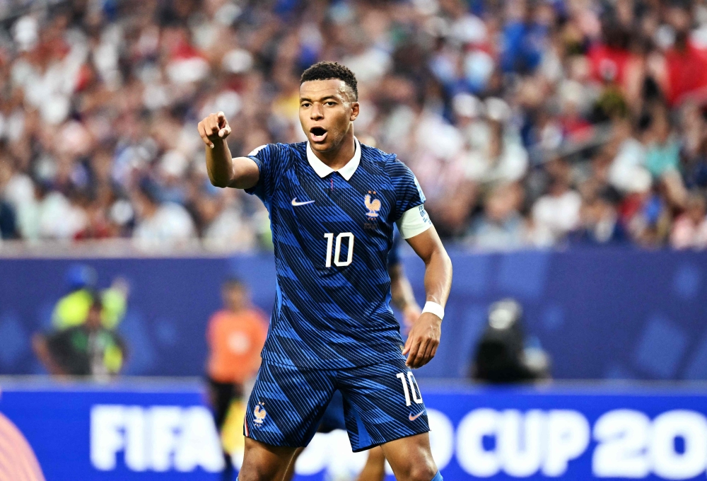France's  #10 Kylian Mbappe reacts. — AFP