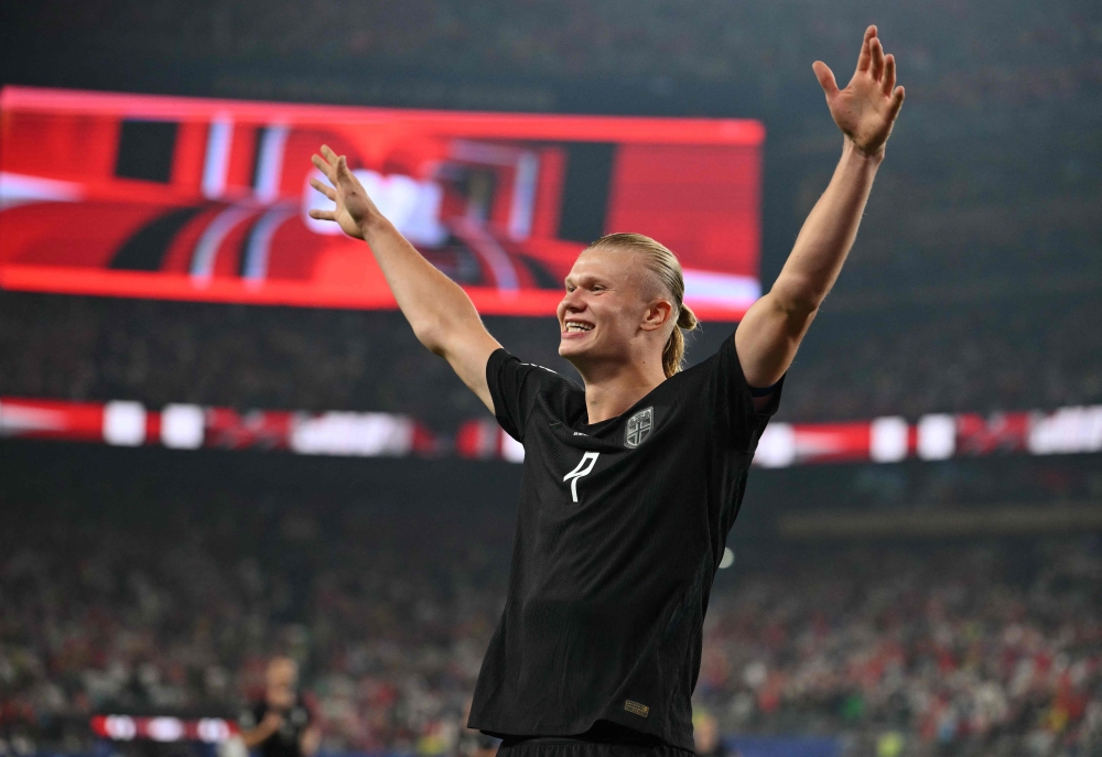  Norway's #09 Haaland celebrates scoring second goal. — AFP