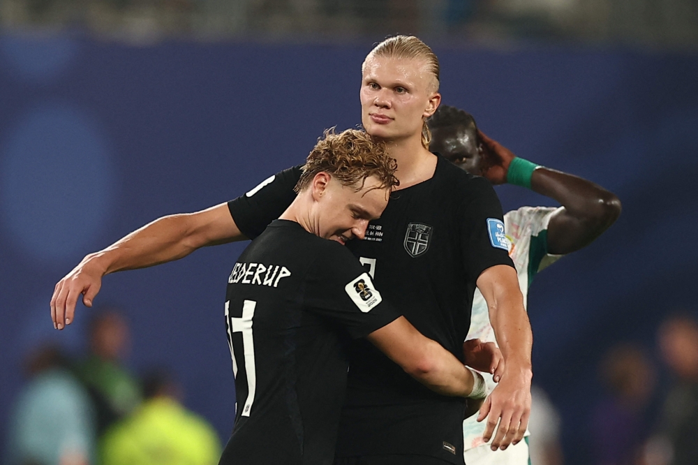 Norway's #21 Schjelderup and #09 Haaland celebrate the winning. — AFP 
