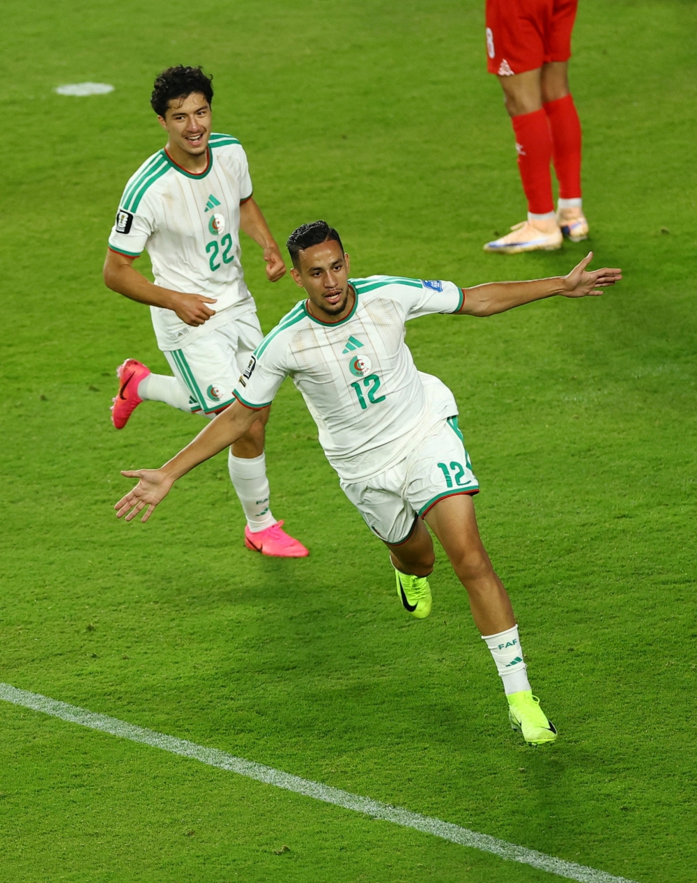  
Algeria's Benbouali celebrates scoring their first goal. — Reuters 