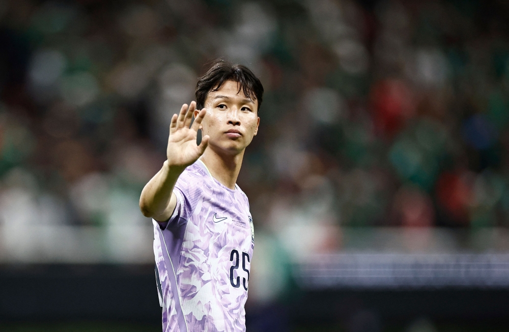 South Korea's midfielder #25 Eom Ji-sung. — AFP