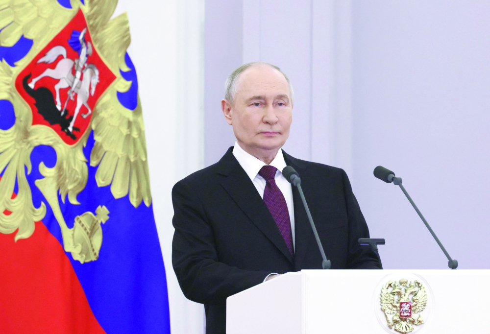 Russia's President Vladimir Putin gives a speech during a meeting at the Kremlin in Moscow. — AFP