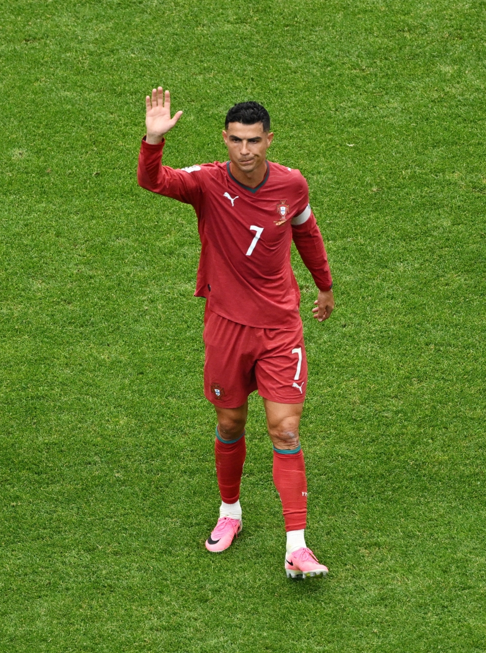  
Portugal's Cristiano Ronaldo salutes their fans after the match. — Reuters   