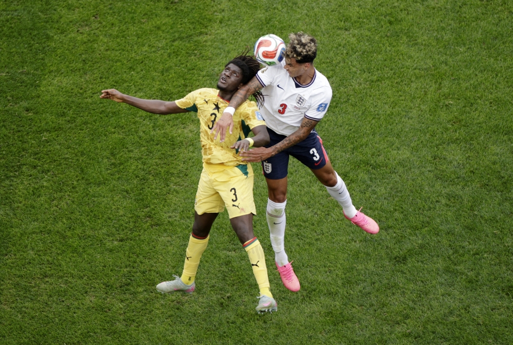 
Ghana's Caleb Yirenkyi in action with England's Nico O'Reilly  