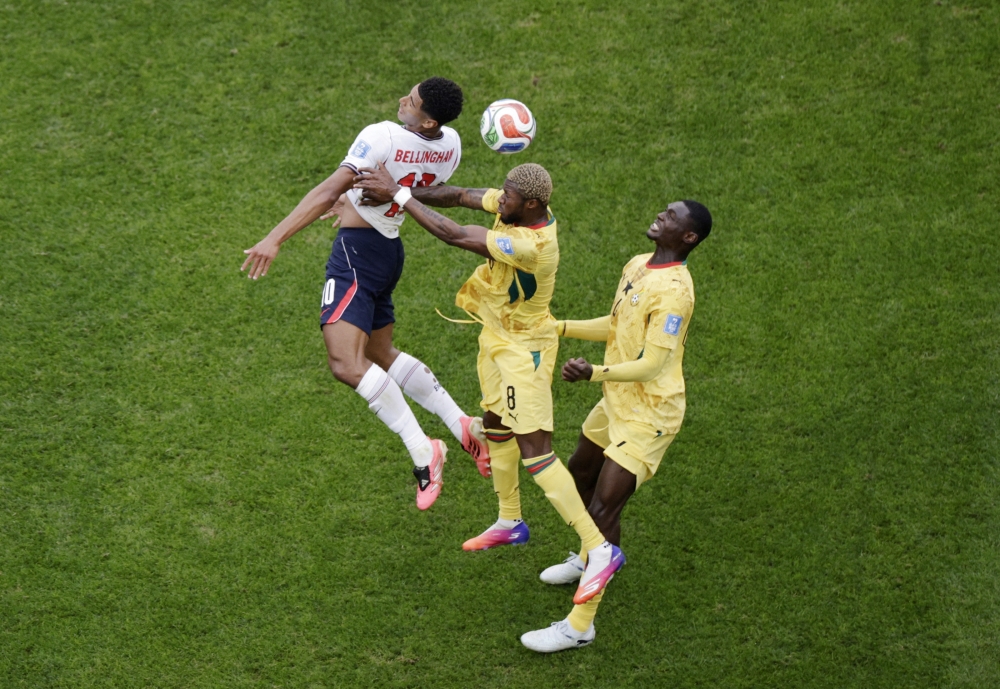 
England's Bellingham in action with Ghana's Sibo and Adjetey. — Reuters