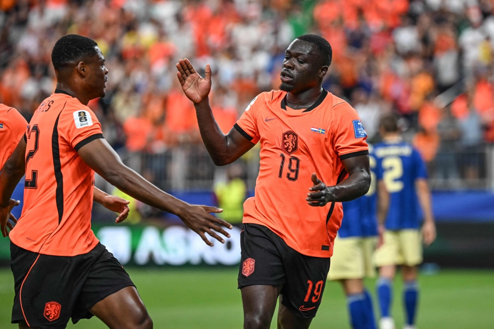 Netherlands' #19  Brobbey and Netherlands' #22 Dumfries. — AFP 