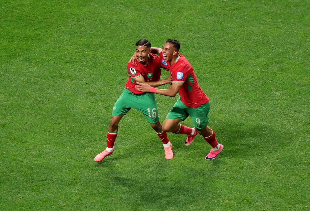 
Morocco's Gessime celebrates fourth goal. — Reuters       