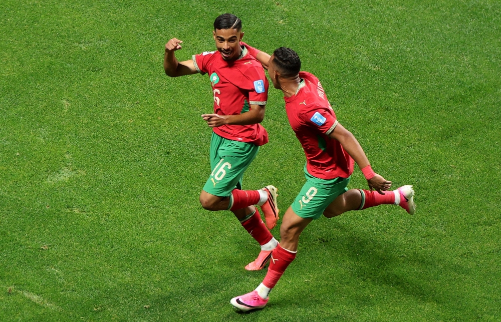  
Morocco's Gessime celebrates fourth goal. — Reuters