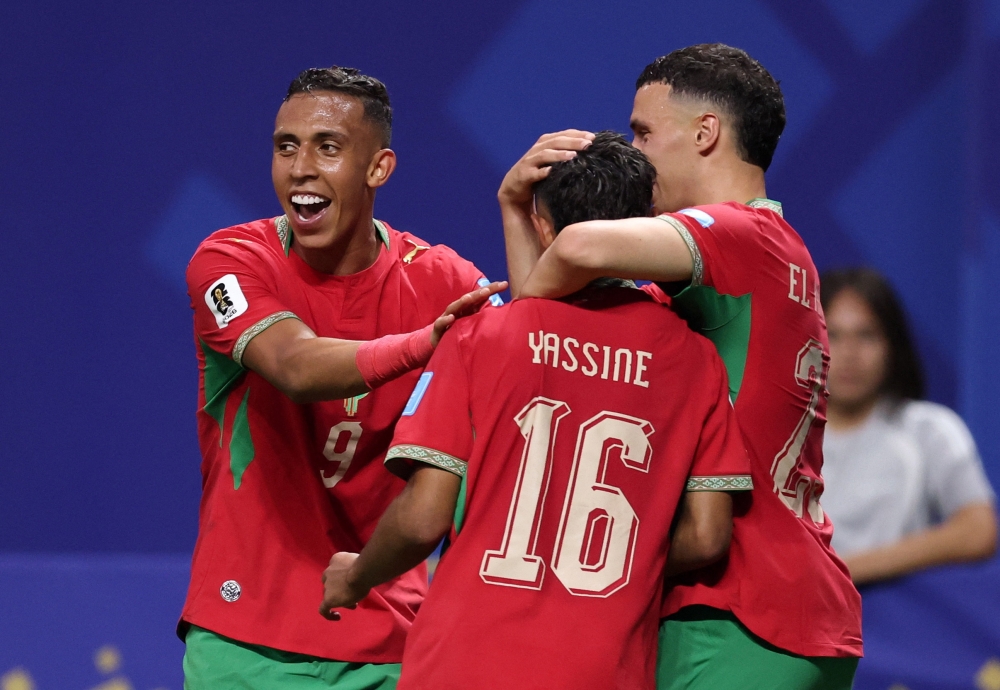  
Morocco's Gessime celebrates fourth goal. — Reuters        
