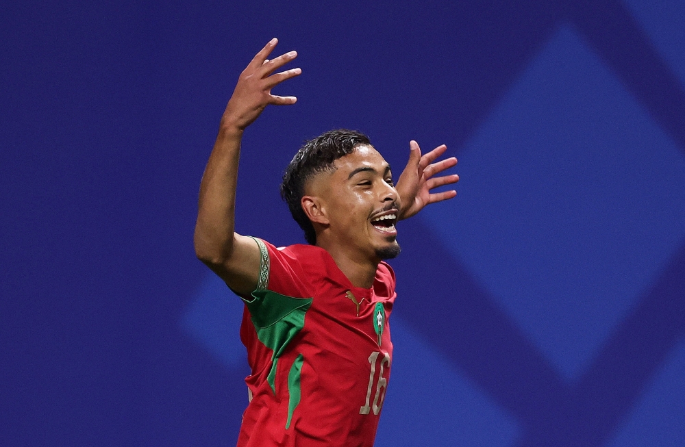  
Morocco's Gessime celebrates fourth goal. — Reuters       