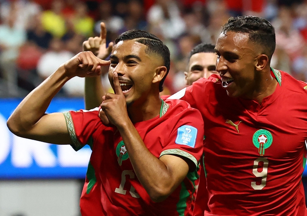  
Morocco's Gessime celebrates fourth goal. — Reuters       