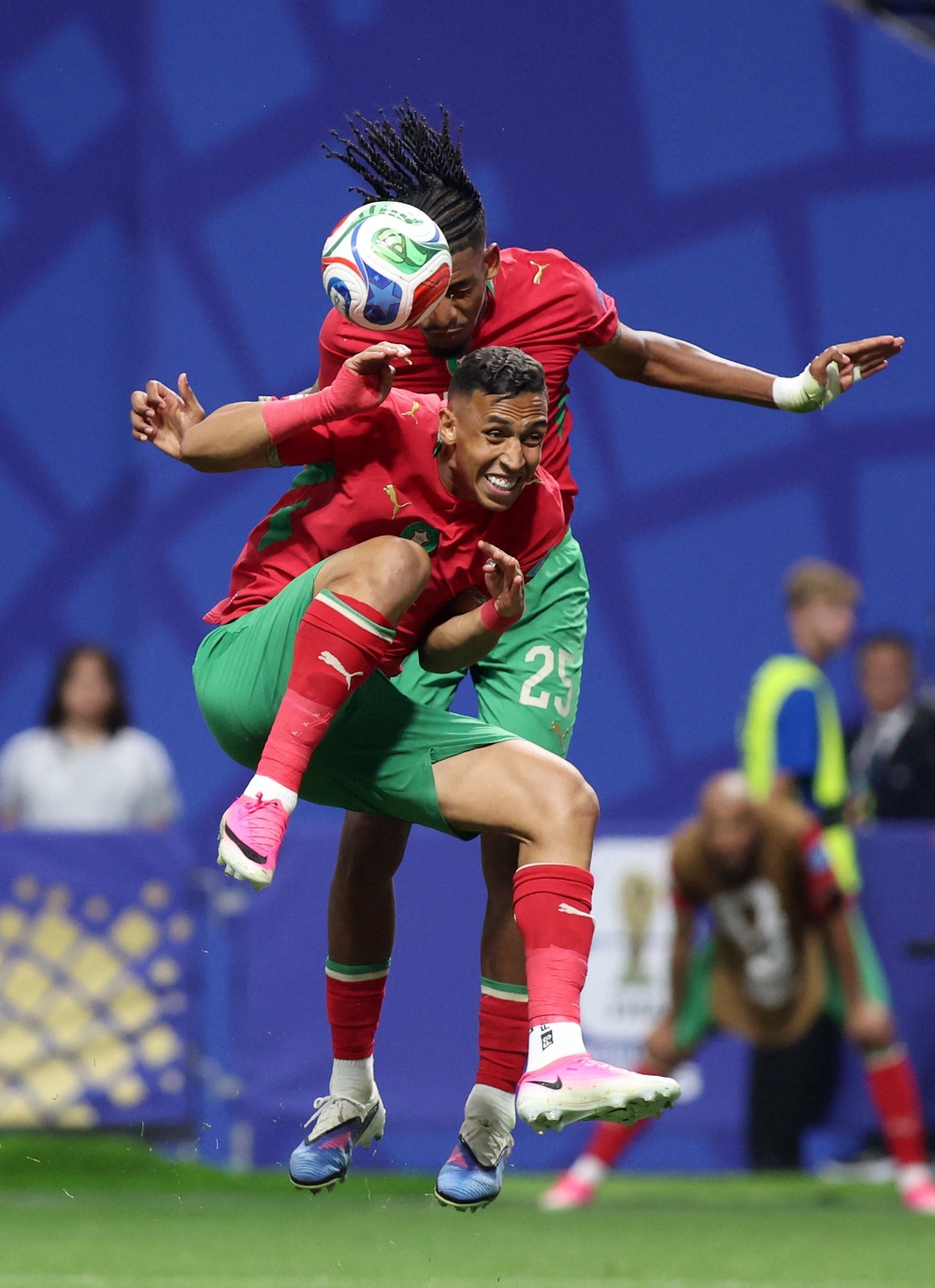  
Morocco's Redouane in action with Rahimi. — Reuters       