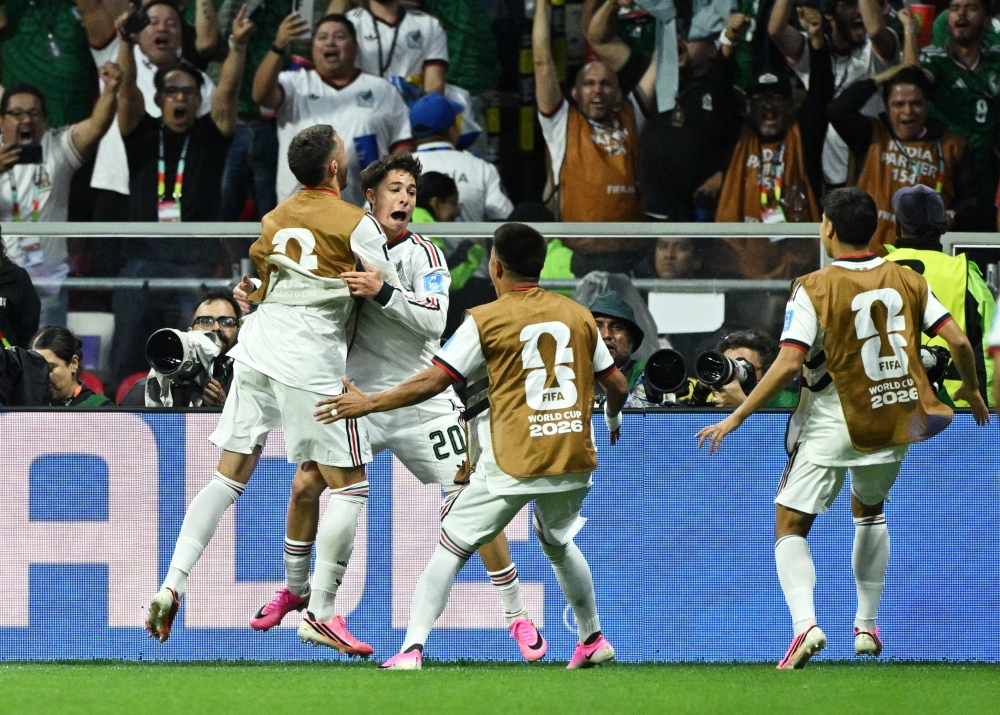  
Mexico's Chavez celebrates scoring their first goal. — Reuters   