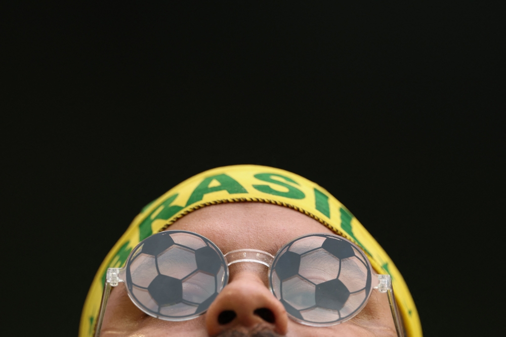 A Brazilian fan attends the 2026 World Cup Group C football match between Scotland and Brazil at the Miami Stadium 