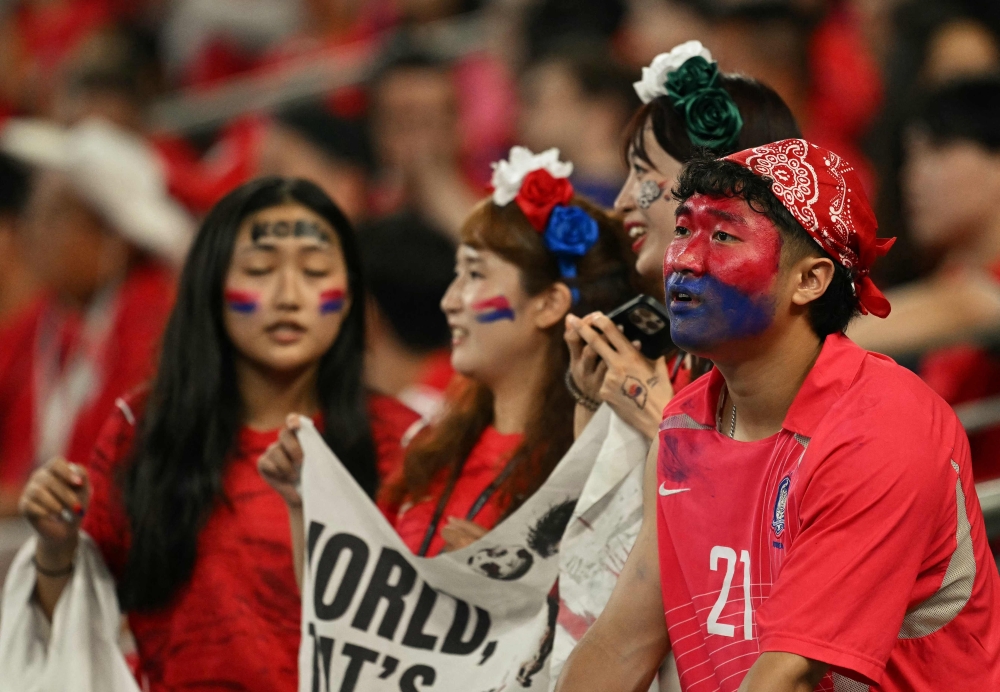 South Korean fans watch from the stands the 2026 World Cup Group A football match between South Africa and South Korea at the Monterrey Stadium 