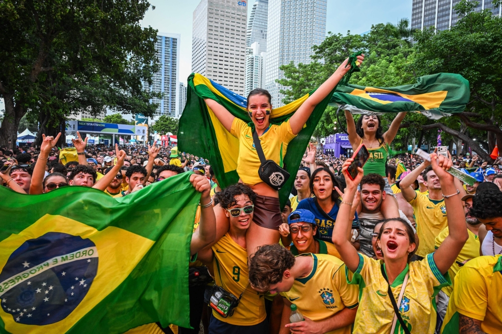 Brazil fans react as they watch the FIFA World Cup 2026 Group C match between Scotland and Brazil during a viewing party at the FIFA Fan Festival in Miami