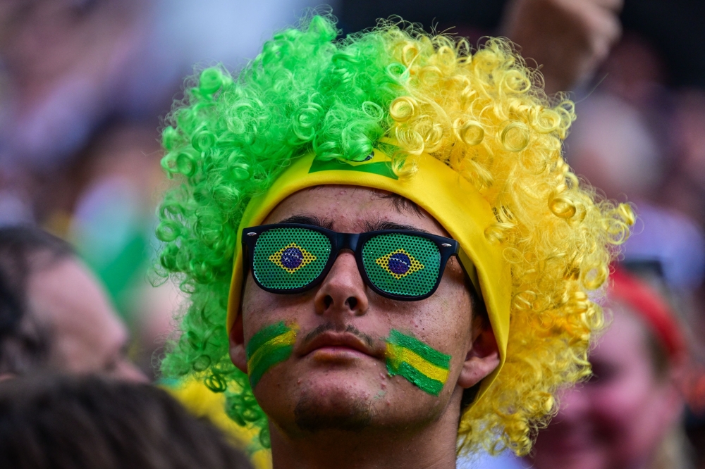 Brazil fans react as they watch the FIFA World Cup 2026 Group C match between Scotland and Brazil during a viewing party at the FIFA Fan Festival in Miami
