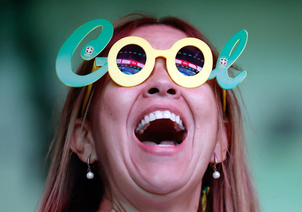  
A Brazil fan reacts as they watch the match 