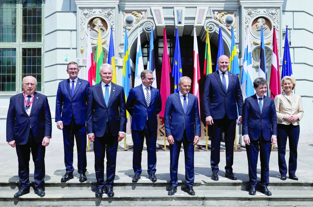 Officials pose for a family photo during the Eastern Flank Summit, parallel event of the Ukraine Recovery Conference (URC 2026) in Gdansk, Poland. — AFP