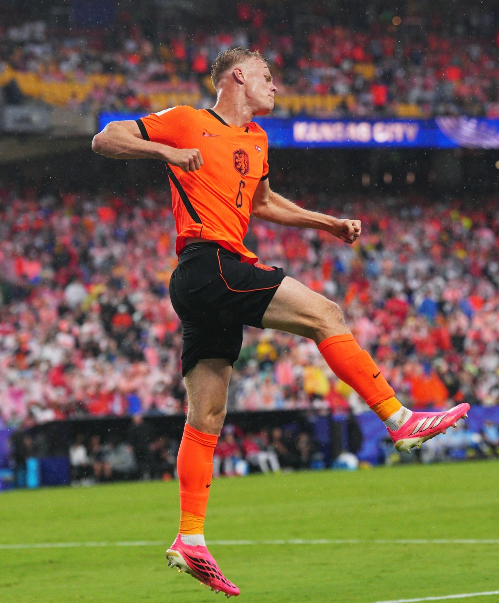  
Netherlands' Jan Paul van Hecke celebrates scoring their third goal. — Reuters