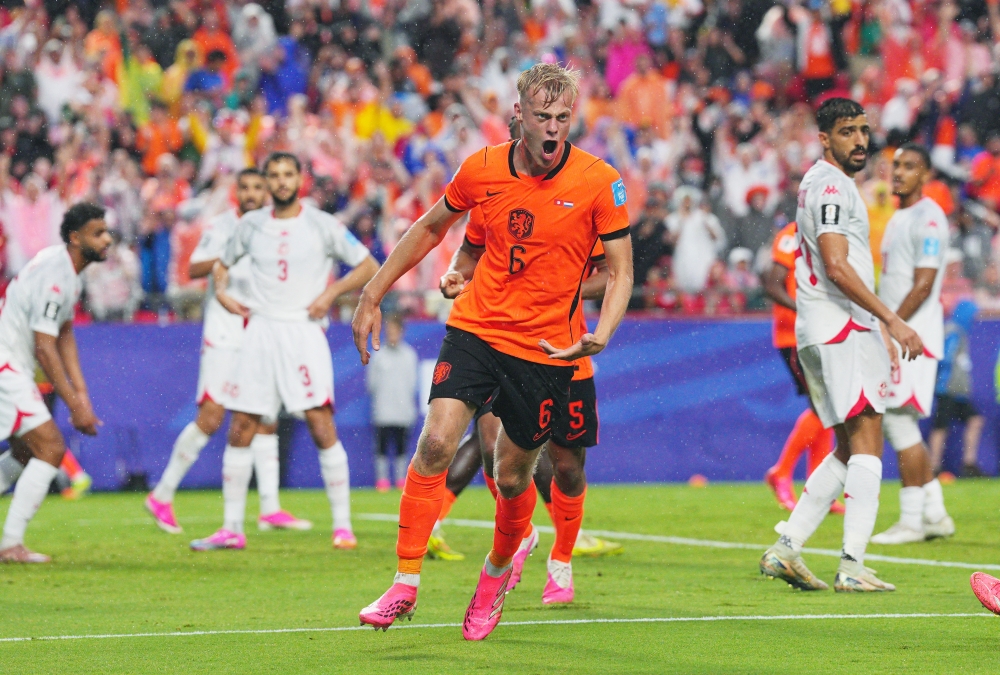  
Netherlands' Jan Paul van Hecke celebrates scoring third goal. — Reuters 