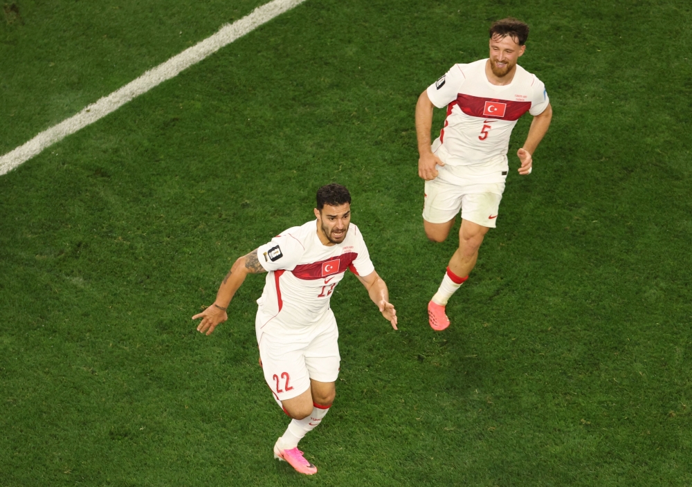 Türkiye's  #22 Kaan Ayhan (L) celebrates after scoring third goal. — AFP