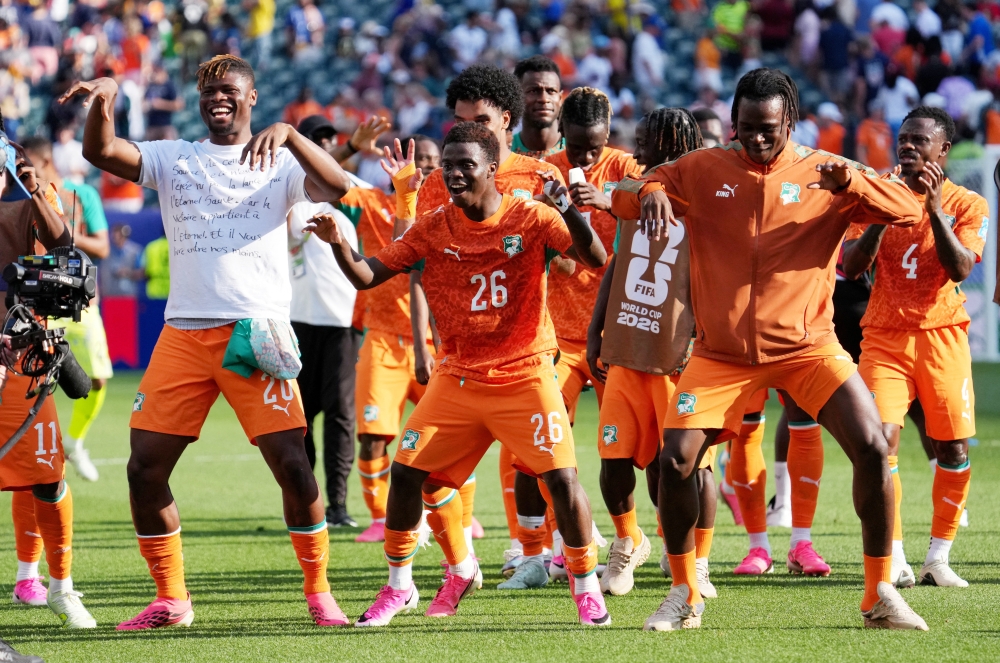  
Ivory Coast's Christ Oulai celebrates with teammates. — Reuters 