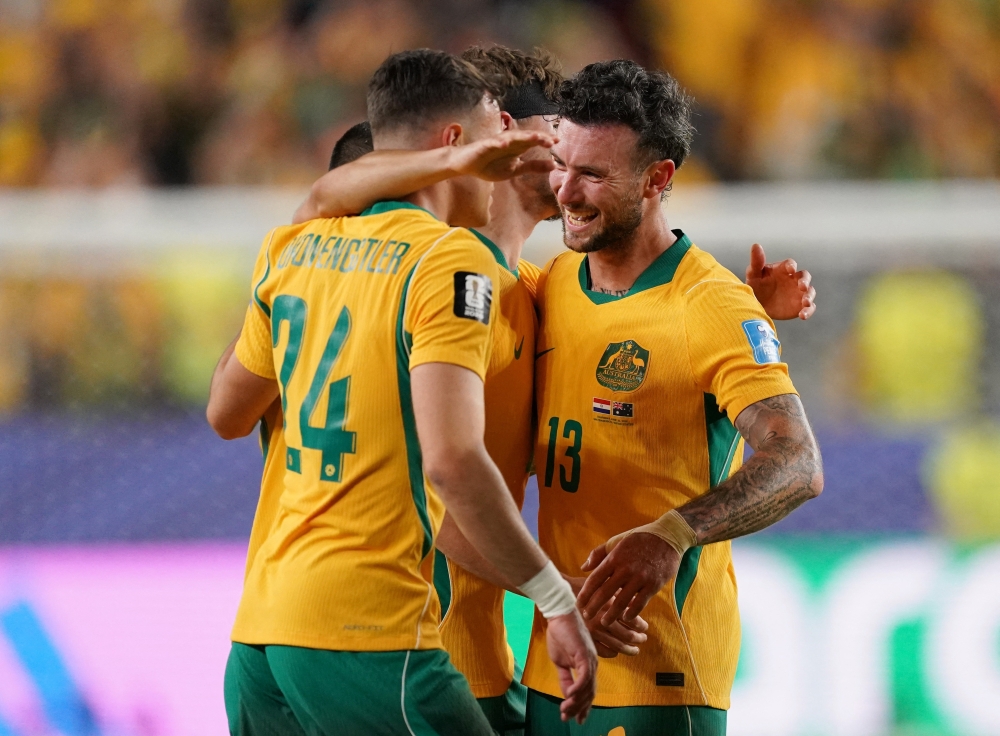  
Australia's Aiden and  Engstler celebrate after the match. — Reuters 