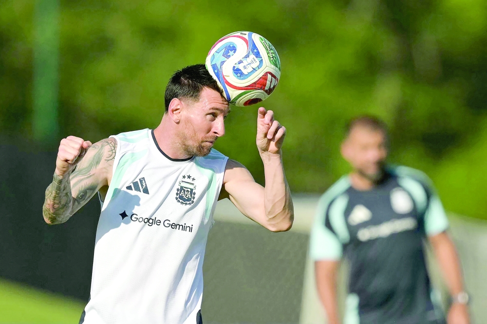 Argentina's forward #10 Lionel Messi heads the ball in a training session during the 2026 World Cup football tournament at Sporting KC Training Centre in Kansas City. — AFP