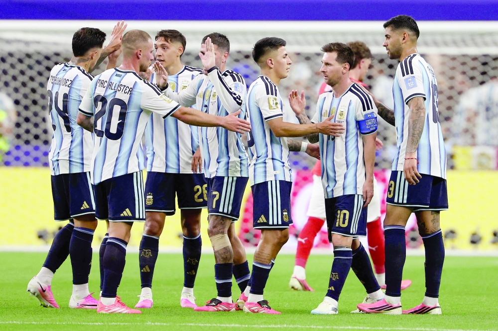 Argentina's forward #10 Lionel Messi (2dnR) and team-mates celebrate at half-time of the 2026 World Cup Group J football match between Argentina and Austria at the Dallas Stadium in Arlington. — AFP