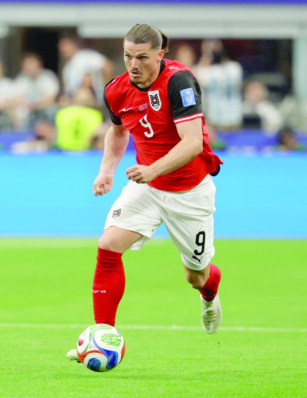  
Austria's Marcel Sabitzer in action  