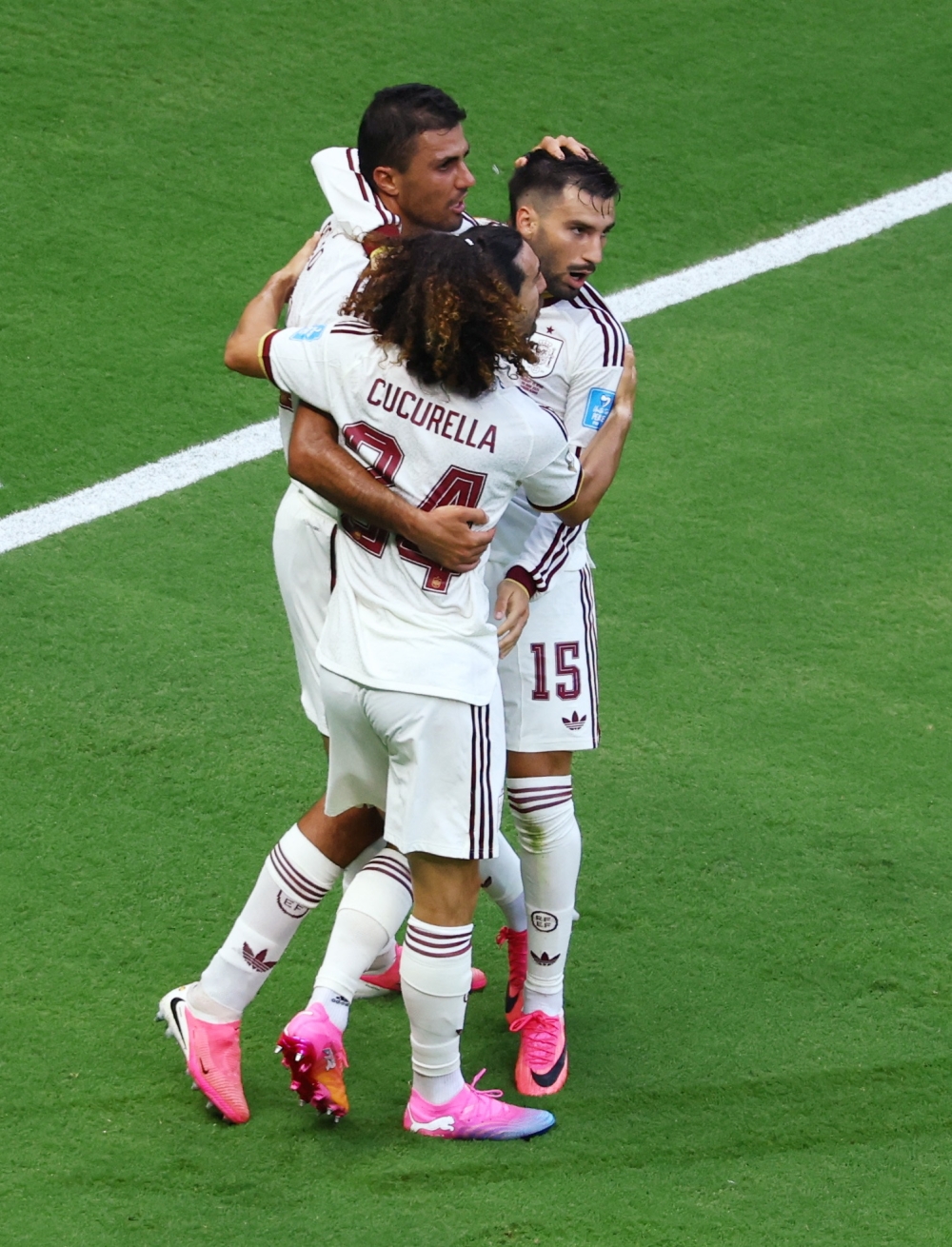 Spain's #15 Baena celebrates scoring  first goal with Marc and Rodri. — Reuters