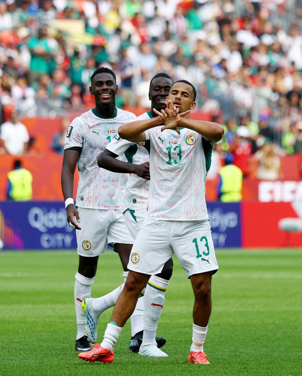  
Senegal's Ndiaye celebrates scoring fifth goal. — Reuters