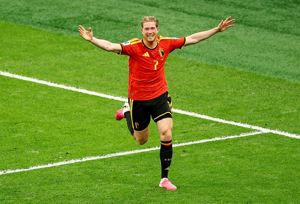 Belgium's De Bruyne celebrates scoring third goal. — Reuters