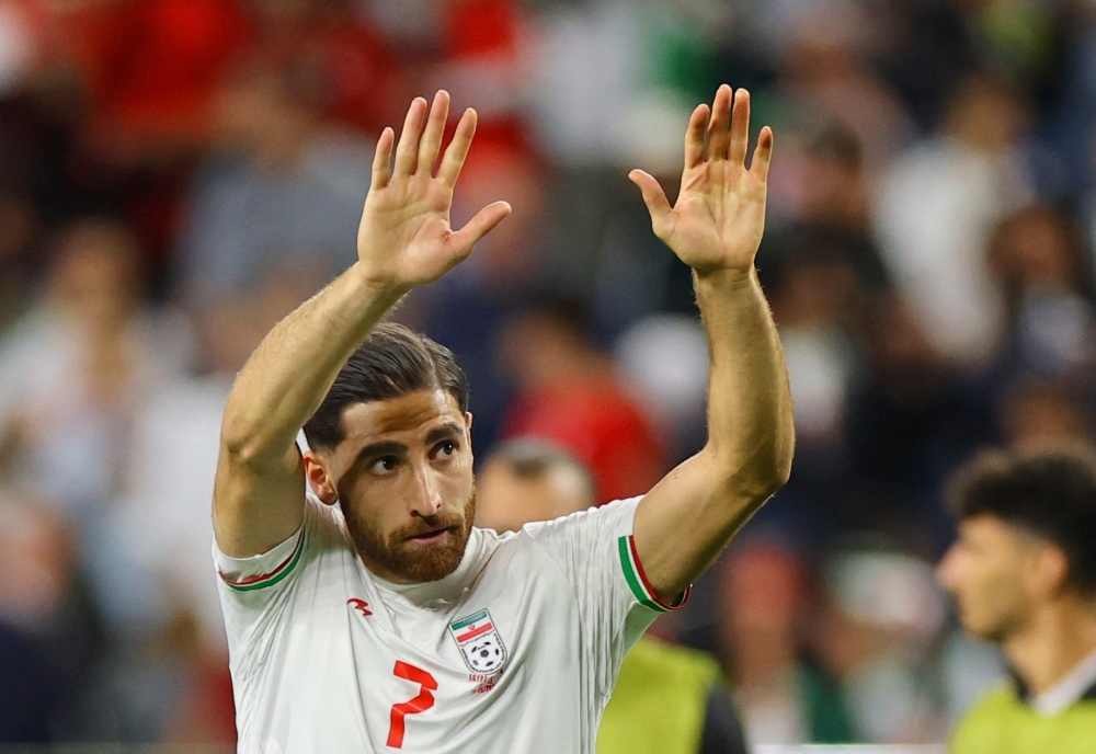  
Iran's Alireza Jahanbakhsh waves to fans. — Reuters 