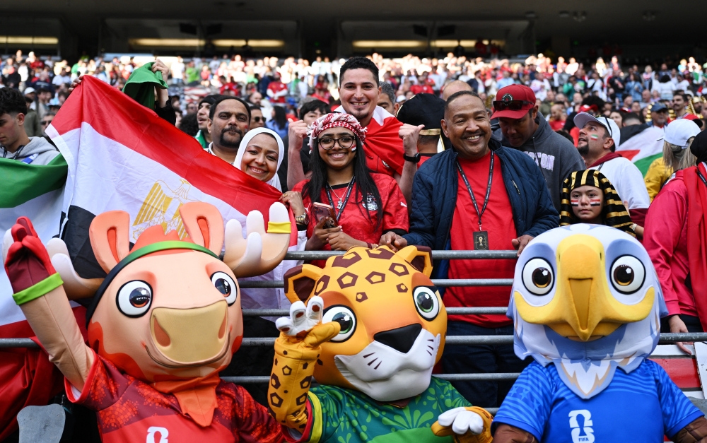  
Egypt fans with FIFA World Cup 2026 mascots Canada's Maple the Moose, Mexico's Zayu the Jaguar and United States' Clutch the Bald Eagle inside the stadium before the match  