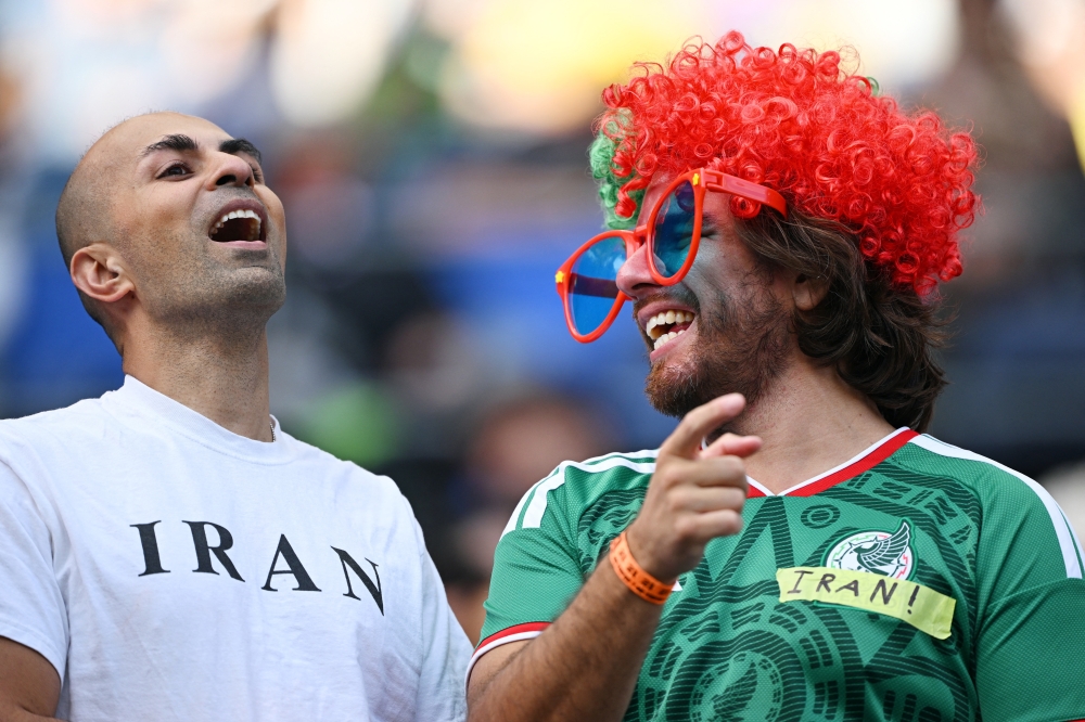  
Iran fans inside the stadium before the match 